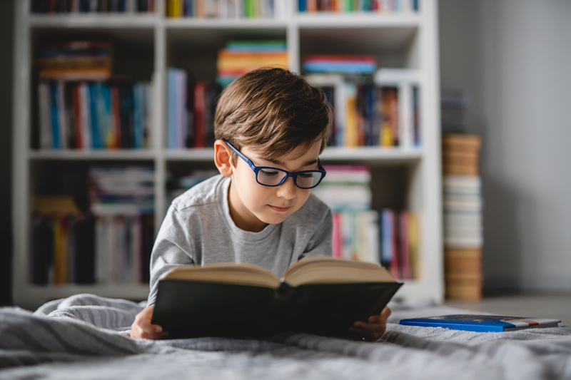 boy reading a book